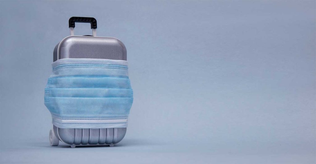 Valise avec un masque jetable