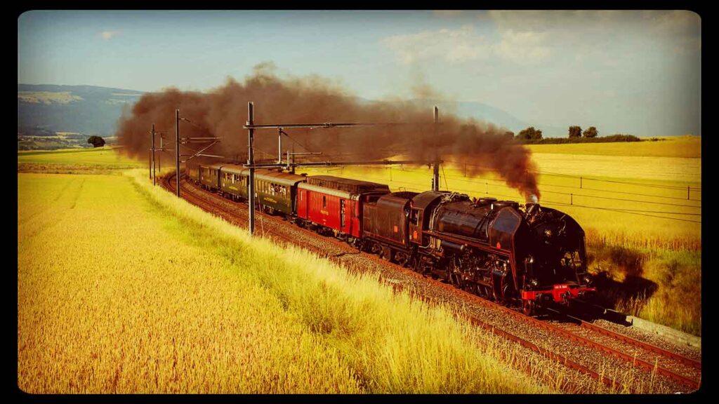 Swiss classic train : repas gastronomique à bord d'un antique train à vapeur en Suisse romande.