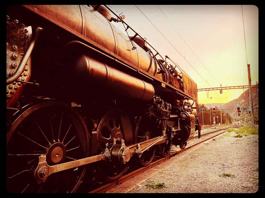 Swiss classic train : repas gastronomique à bord d'un antique train à vapeur en Suisse romande.